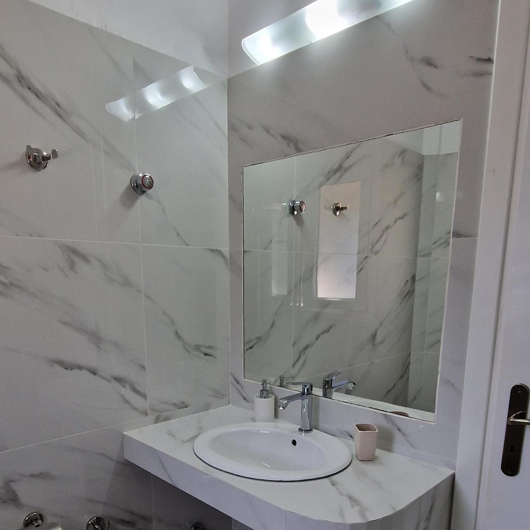 Panorama Apartments Fiscardo ฟิสคาร์โด ภายนอก รูปภาพ